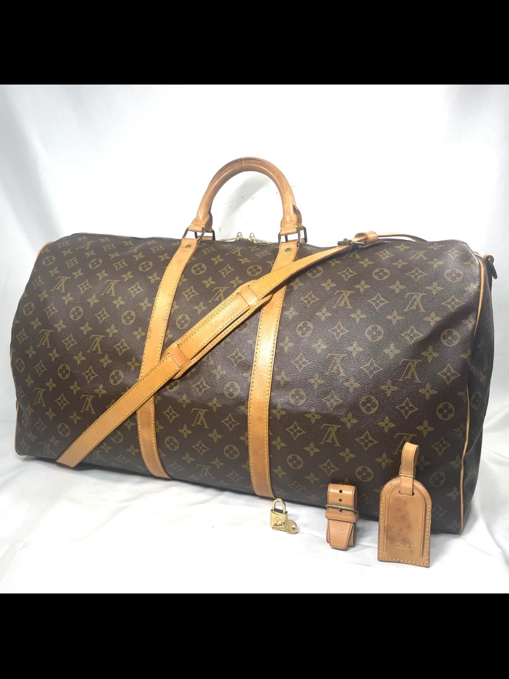 Louis Vuitton Monogram Canvas Duffel with Vachetta Trim in Brown and Tan